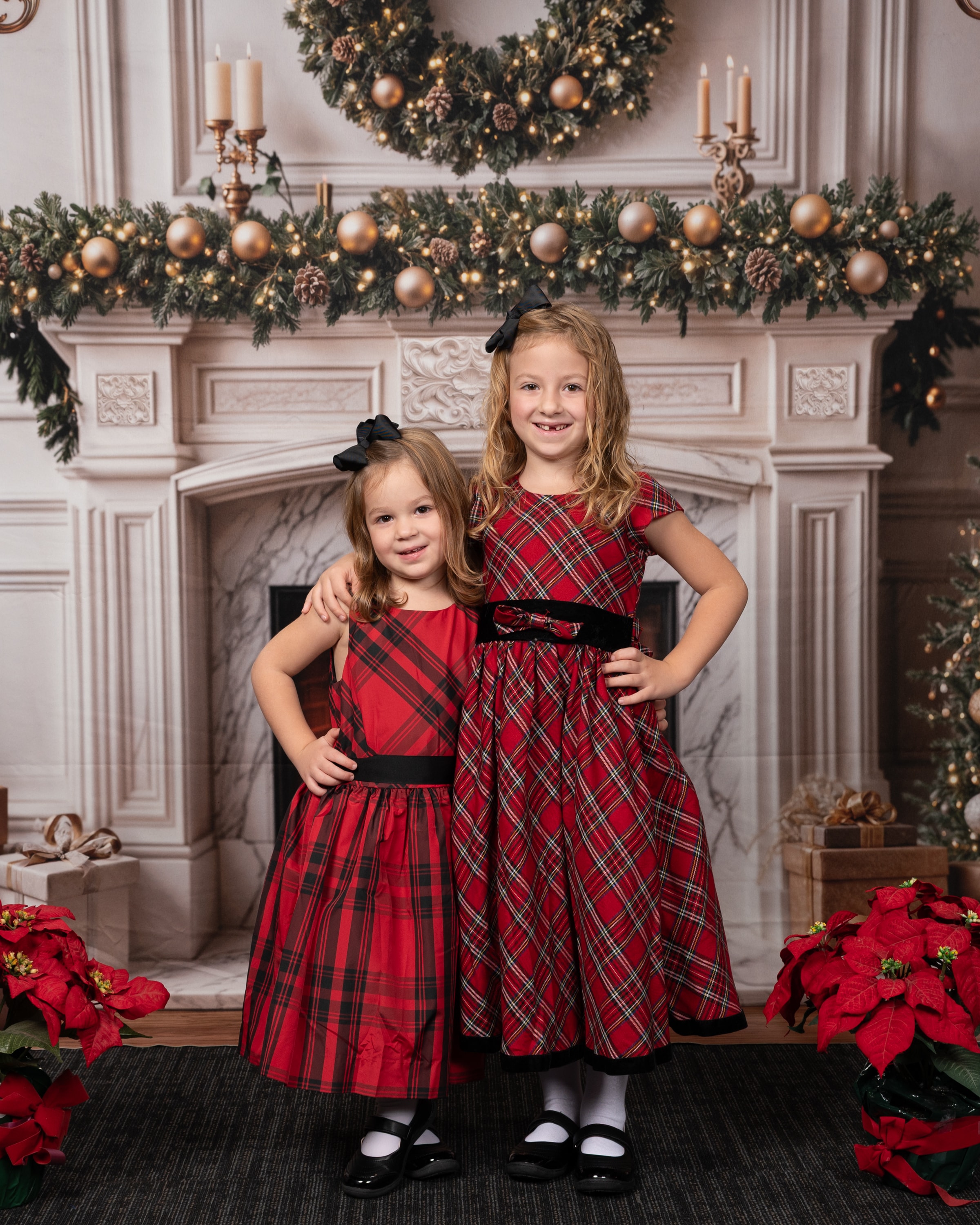 Girl on rocking horse by fireplace backdrop