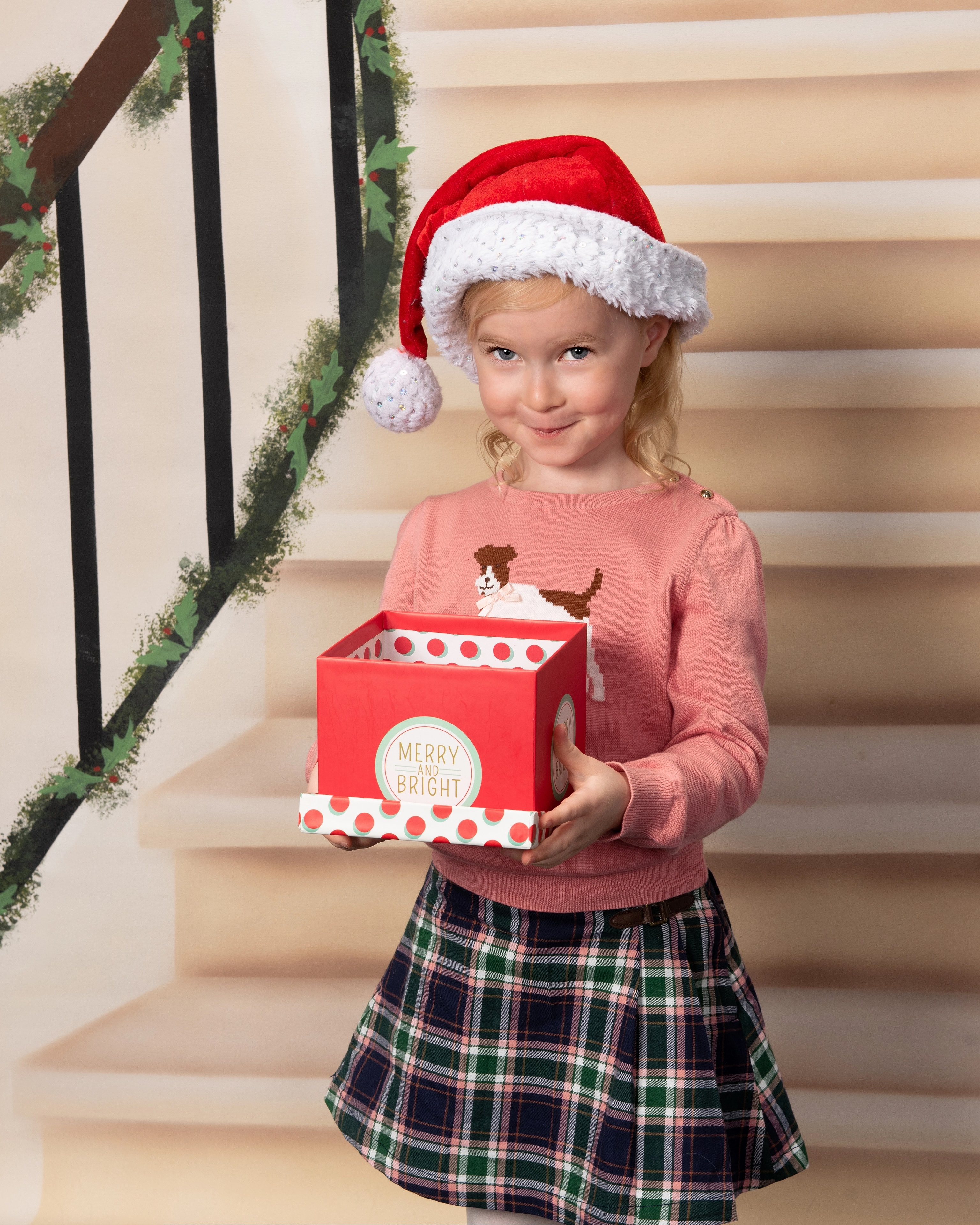 Child with Santa hat North Pole backdrop