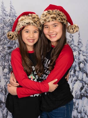 Child in winter wonderland snowflake backdrop