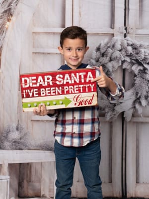 Family in gold glam holiday backdrop